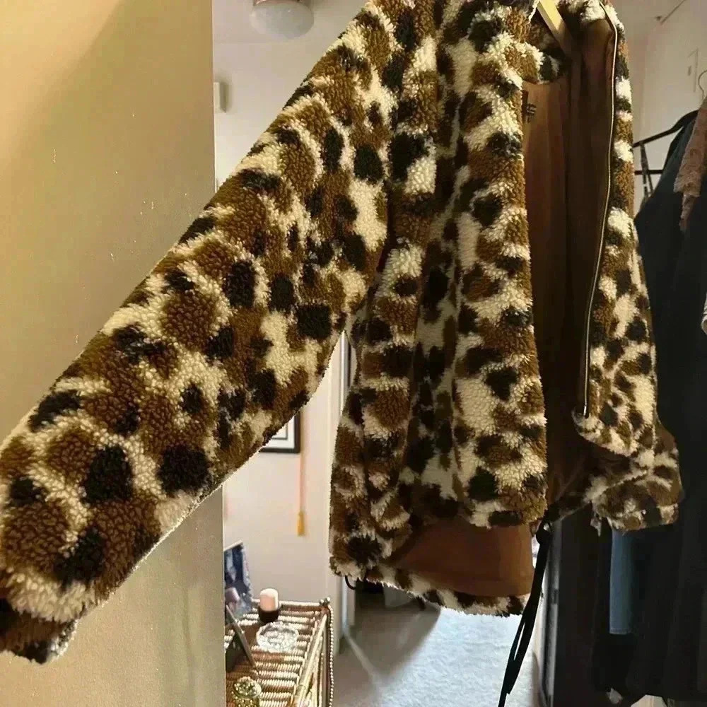 Ugg Olympia Fleece Cropped Jacket with Hood in Cow Print (white, black, & brown)